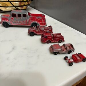 Vintage Tootsie Toy fire trucks, military jeep 1940s-1950s.